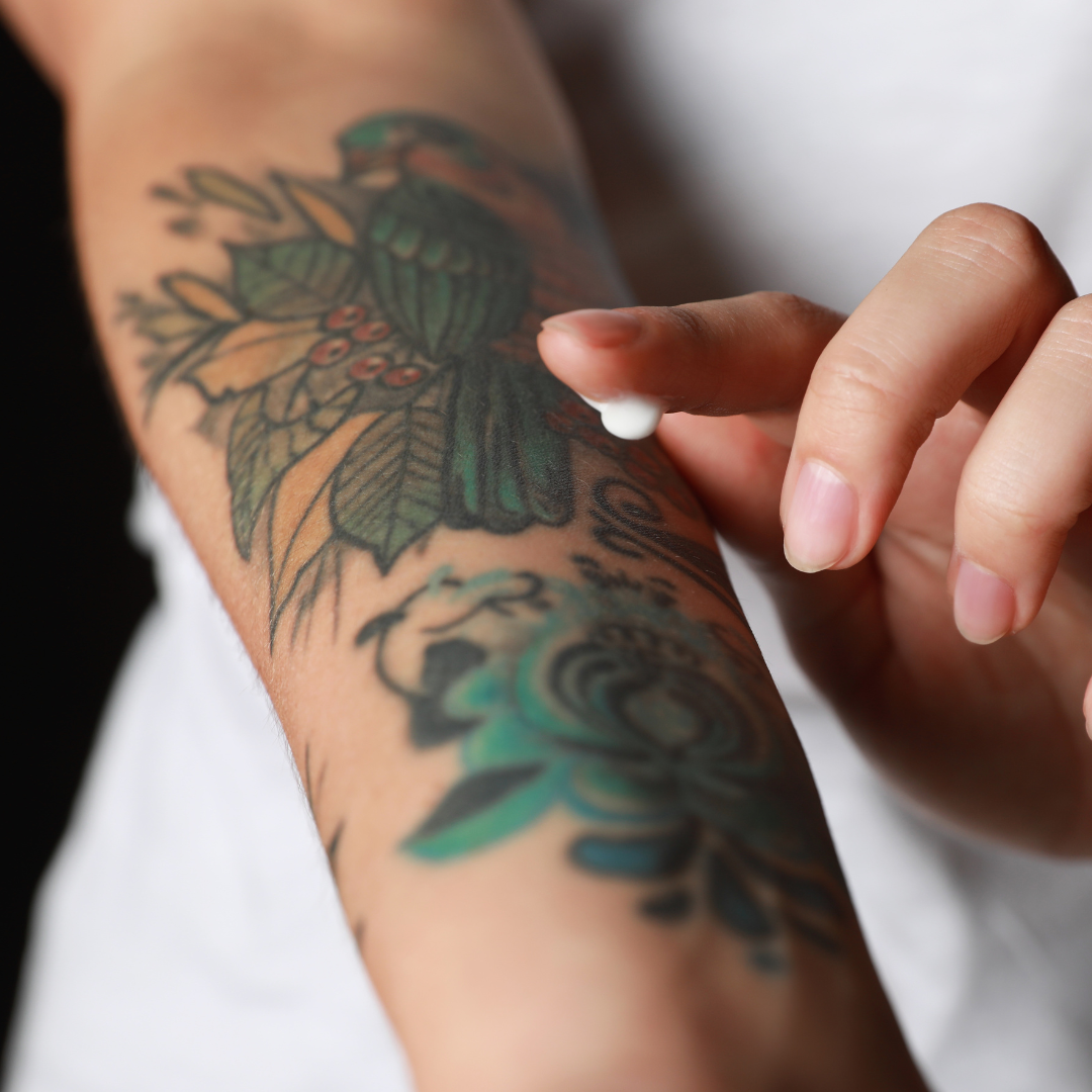 Applying Tattoo Numbing cream